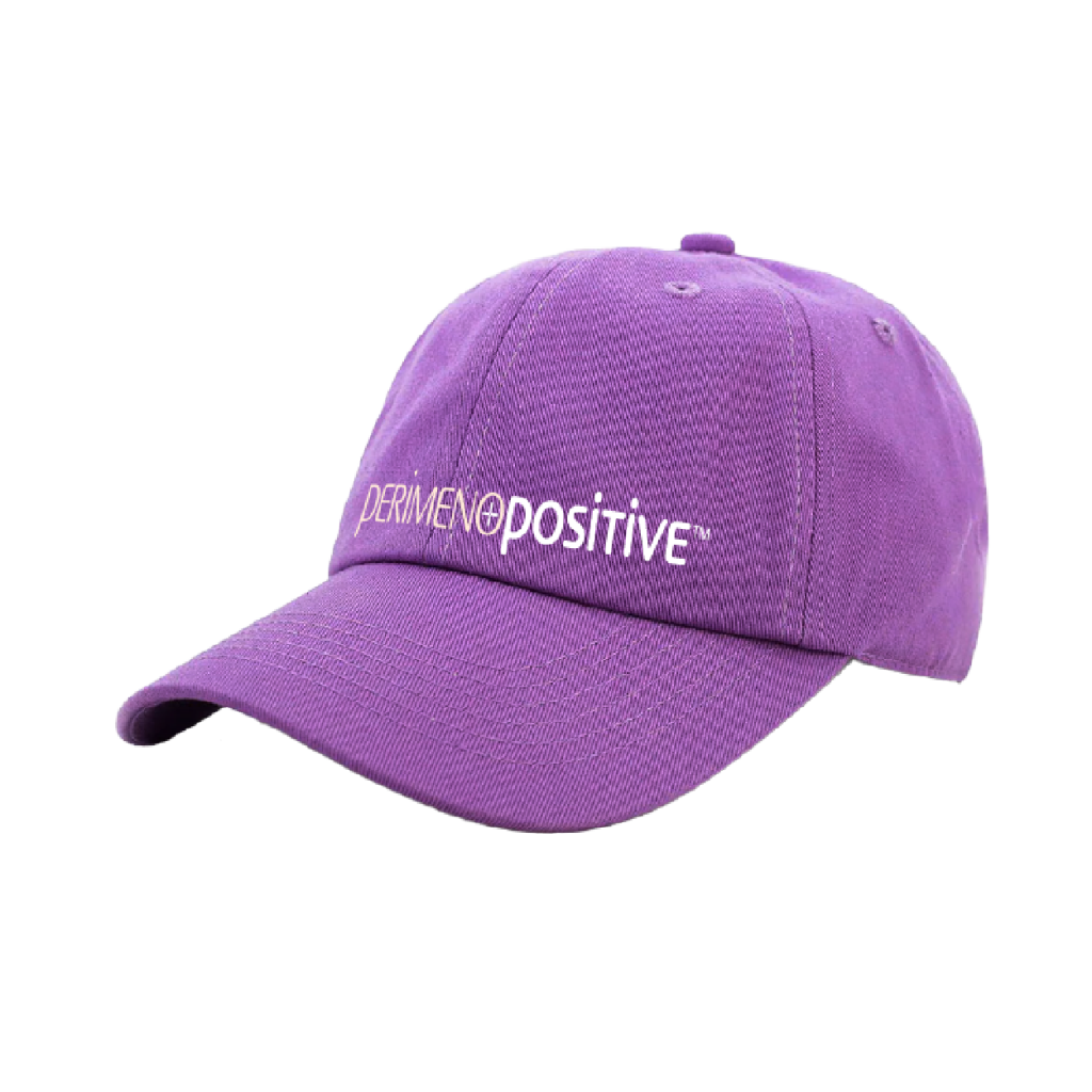 A purple hat with the perimenopositive logo on it