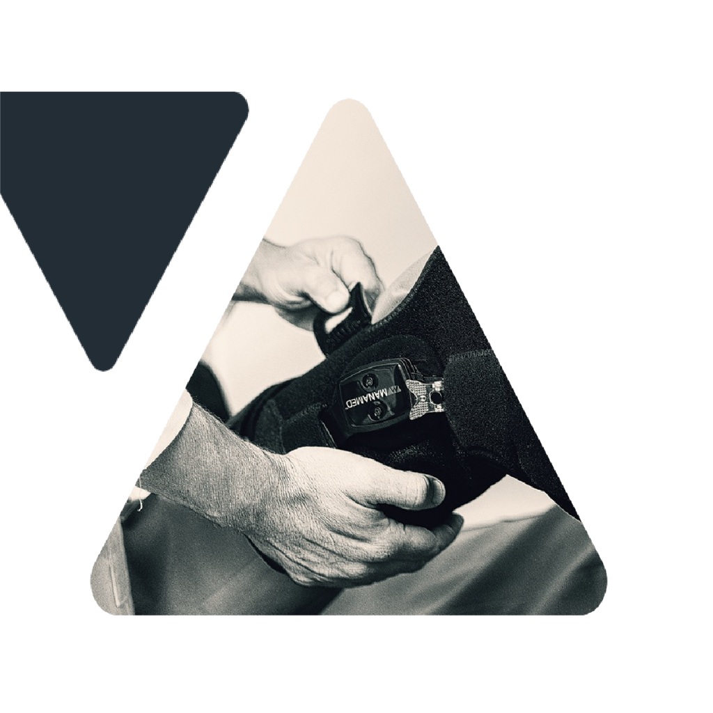 Two triangles, one fully grey, the other containing a photo of somebody putting a ManaMed brace onto a patient